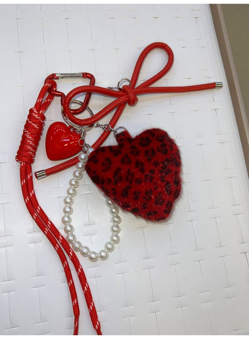 Stylish heart-shaped bag and key charms in various colors - Image 1
